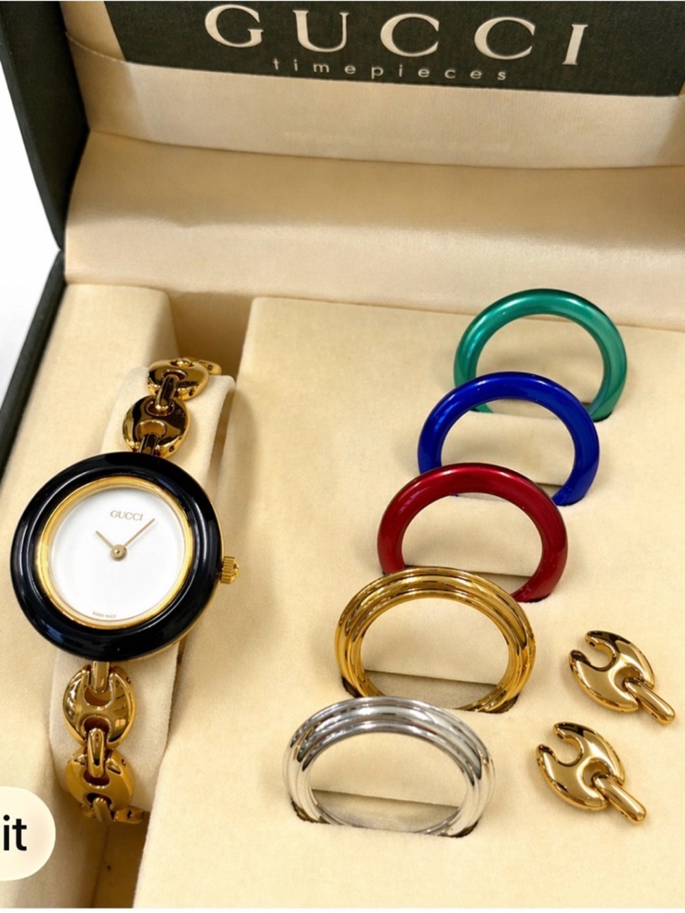 Gucci Gold Bracelet Watch with Interchangeable Bezels in Black, Red, Blue, Green